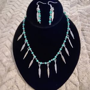 Feather and turquoise bead necklace and matching earrings.